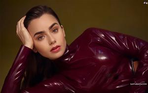 Lily Collins looks gorgeous in shiny burgundy outfit